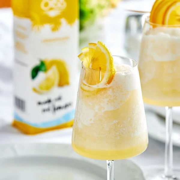 Island Oasis Lemonade Fruit Puree Beverage Mix, 1 Liter (Pack of 2) with By The Cup Coasters